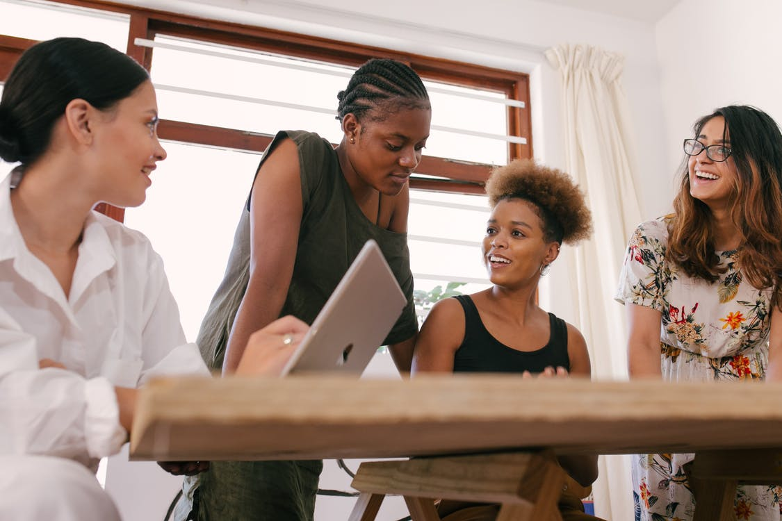 Women discussing business matters