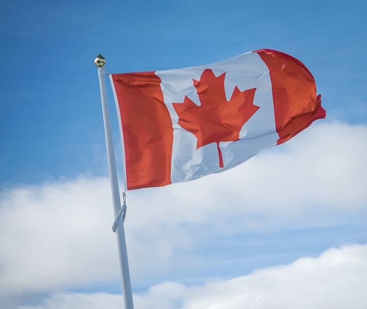 Nanda & Associate Lawyers Canada - Canadian Flag on a flagpole
