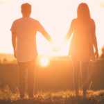 Nanda & Associate Lawyers Canada - Couple holding hands watching the sunset