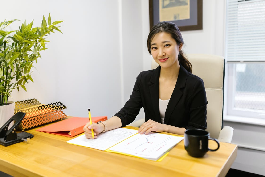 A lady working on a desk