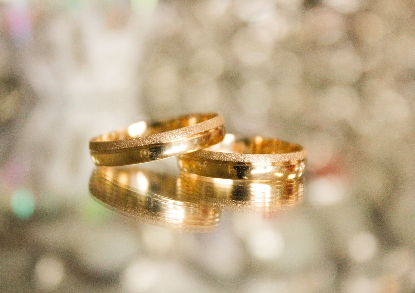 Nanda & Associate Lawyers Canada - Closeup of two gold wedding rings