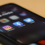 Nanda & Associate Lawyers Canada - Phone with social media apps.
