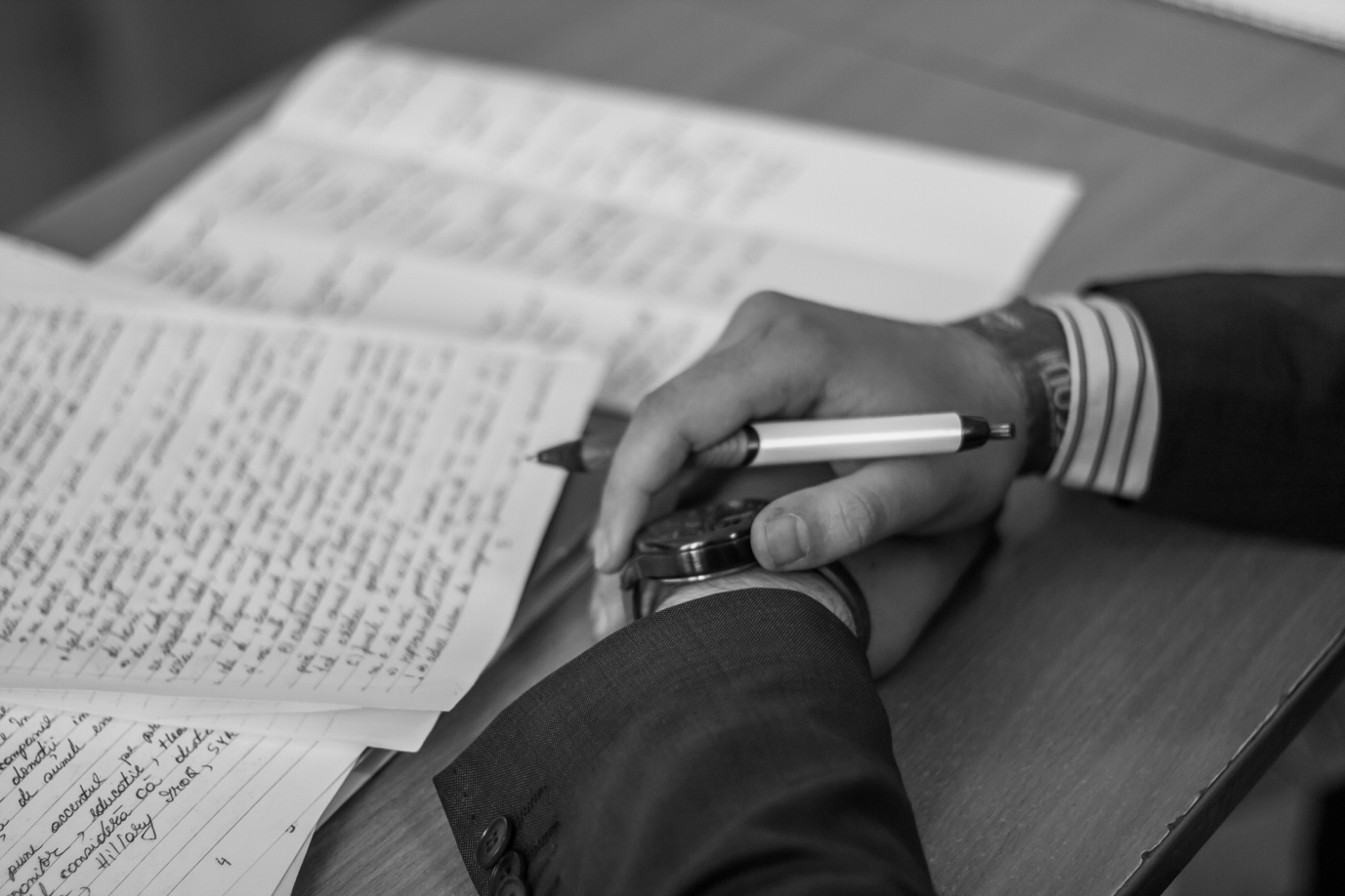 Nanda & Associate Lawyers Canada - Black and white image of a man with handwritten documents
