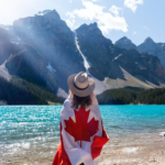 Nanda & Associate Lawyers Canada - A person with a Canadian flag