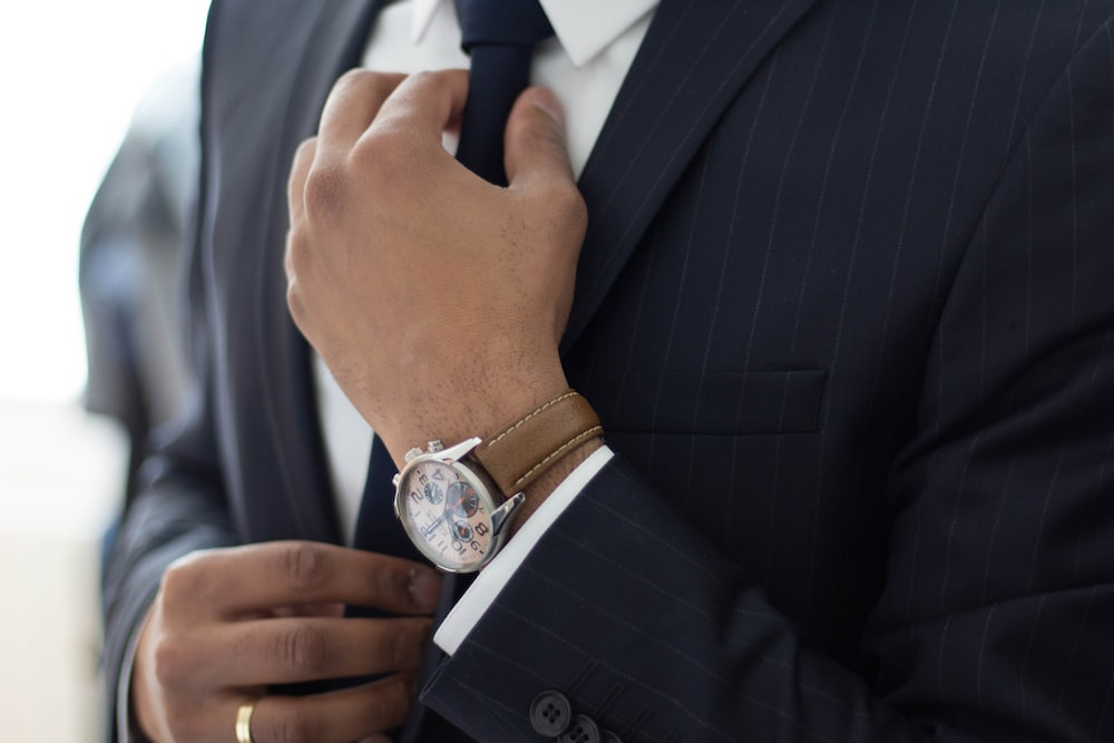 Nanda & Associate Lawyers Canada - A lawyer fixing their tie