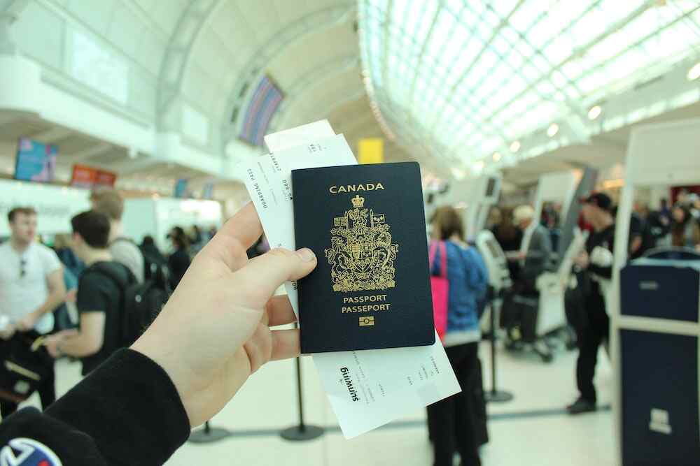 Nanda & Associate Lawyers Canada - Person holding a Canadian passport