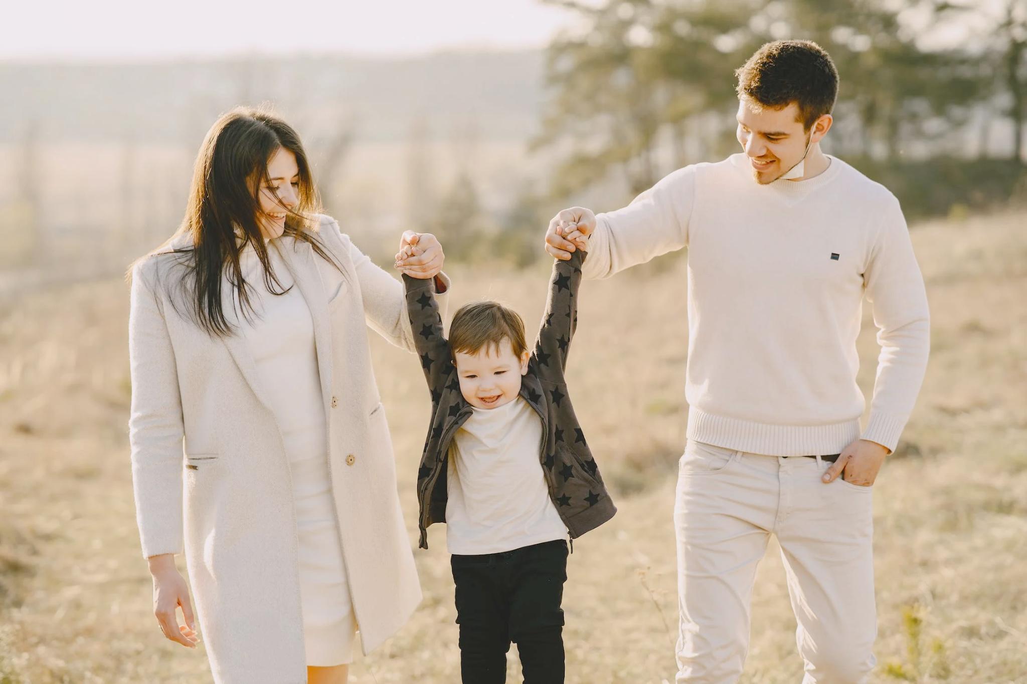 Nanda & Associate Lawyers Canada - An image of a family playing outdoors