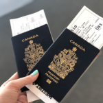 Nanda & Associate Lawyers Canada - A person holding Canadian passports