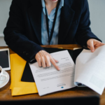 Nanda & Associate Lawyers Canada - A person going through a document