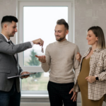 Nanda & Associate Lawyers Canada - A real estate lawyer handing over keys