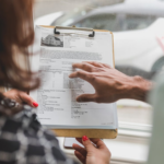 Nanda & Associate Lawyers Canada - A woman looking a house’s documents