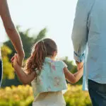 Family lawyer reviewing financial documents with a client