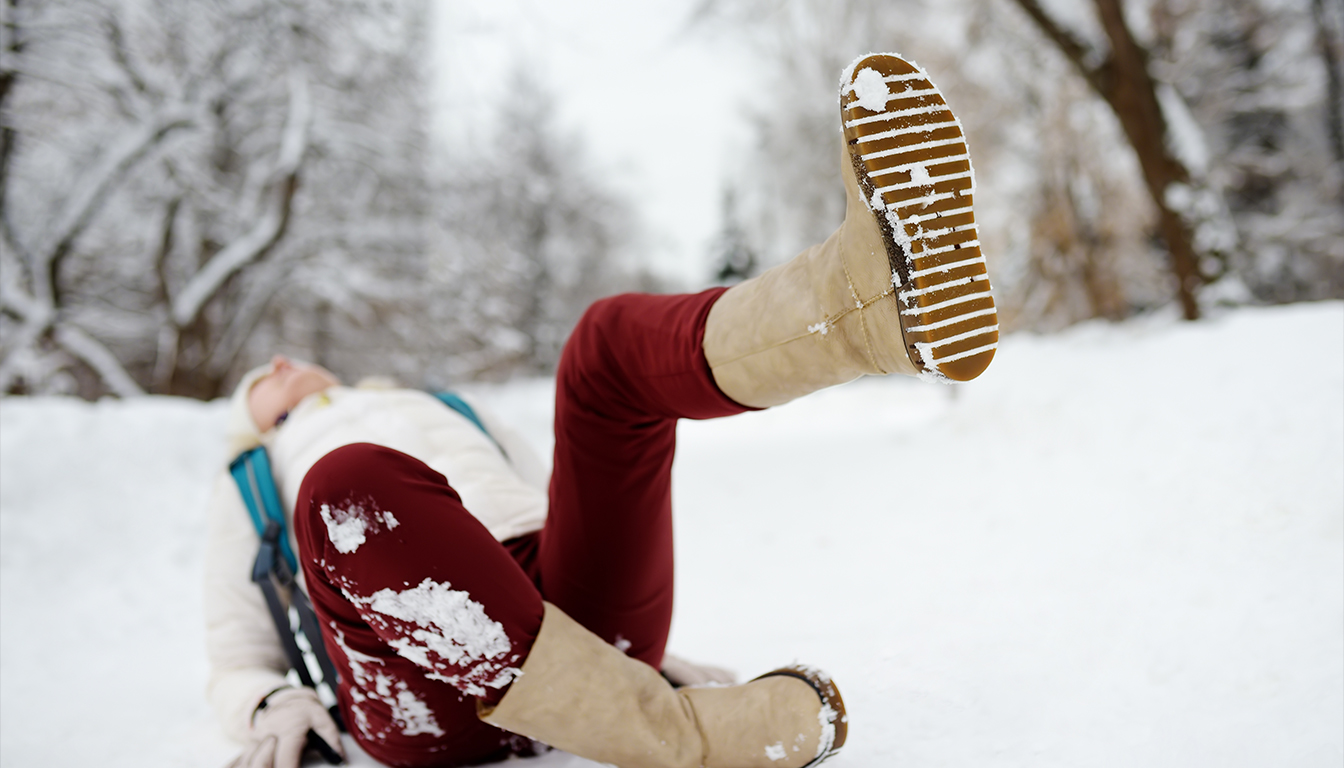 Injured person after a slip and fall discussing claim with a lawyer