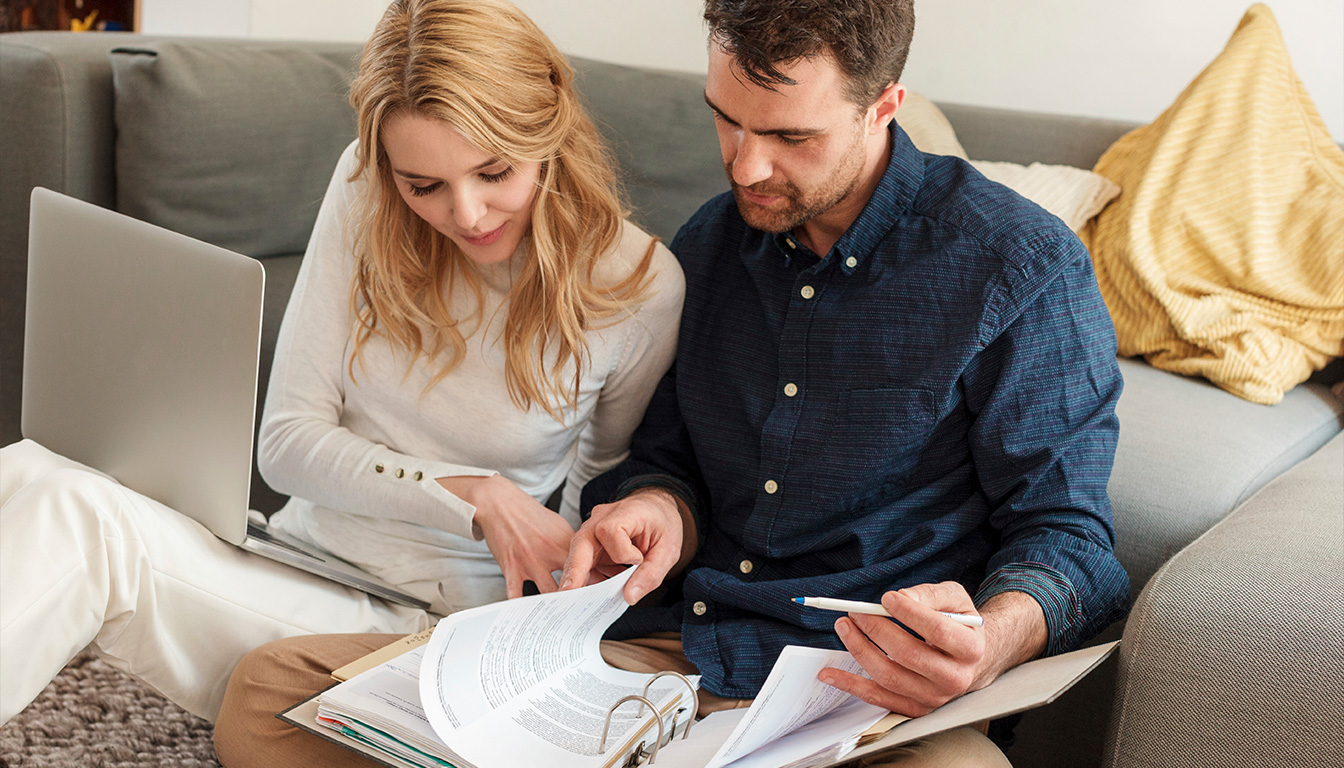 Couple discussing common law rights with a lawyer in Mississauga