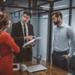 How property is divided after divorce in Ontario showing couple separating assets including family home and financial documents