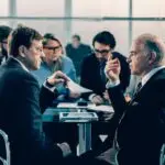 civil litigation lawyer Mississauga discussing legal dispute with client in office meeting