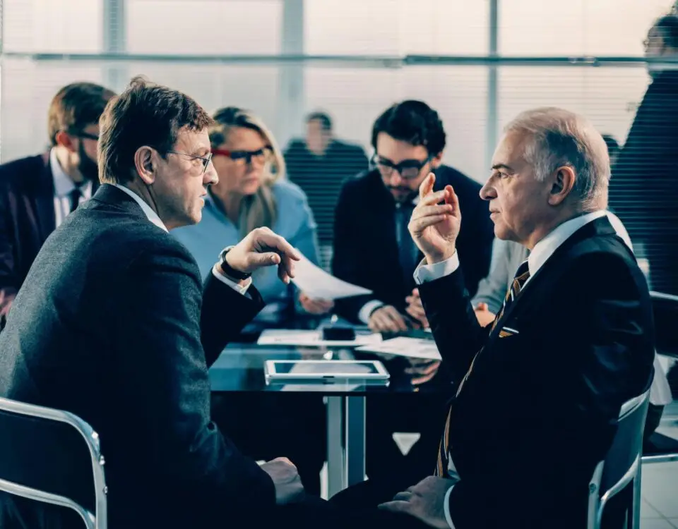 civil litigation lawyer Mississauga discussing legal dispute with client in office meeting